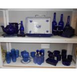 2 shelves of blue (and white) kitchenalia including cheese dish, teapot, condiment bottles,