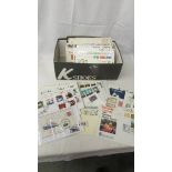 A box of first day covers etc.