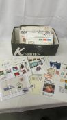 A box of first day covers etc.