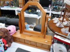 A solid pine dressing table mirror with 3 drawers