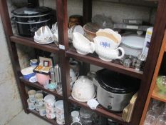 A large lot of kitchenalia including crock pot/slow cooker, perculator etc.