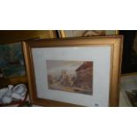 A framed and glazed watercolour village scene signed W R Burrows.