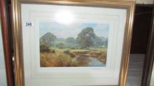 A framed and glazed limited edition print Landscape by David Dipnell, 500/500.