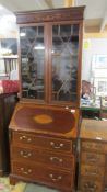 A mahogany inlaid bureau book case.