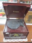 A Steepletone vintage style record player with cd (missing lead which can be obtained) height 18cm