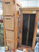 A teak cd cabinet and pine bathroom stand with 4 wicker drawers