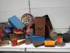 A mixed lot of old tins.