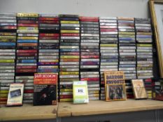 A mixed lot of 200+ cassette tapes, includes Elvis, John Denver, Art Garfunkel, Paul Robeson,