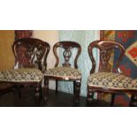 A set of 4 Victorian mahogany dining chairs.