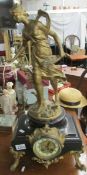 A 19th century French clock with ormolu mounts and surmounted female figure, a/f.