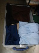 A quantity of sweaters etc.