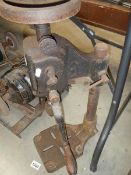 An old cast metal hand bench drill.