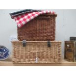 2 wicker picnic baskets and 2 small picnic table clothes