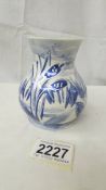 An Anita Harris Studio Pottery blue & a white lustre dragonfly design vase, 10 cm tall,