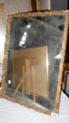 An early 20th century gilt framed mirror.