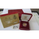 A 2002 gold proof half sovereign,