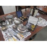 A good collection of silver plate items including tea/coffee pots, cutlery etc.