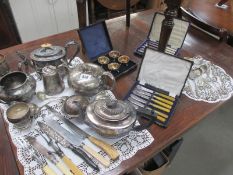 A good collection of silver plate items including tea/coffee pots, cutlery etc.