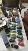 A mixed lot of die cast model vehicles.