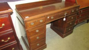 A mahogany double pedestal desk.