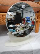 A retro style circular mirror.