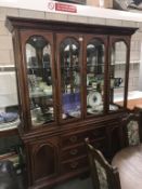 A large mahogany glazed top cabinet with 2 doors and 3 drawers Height 200cm, width 147cm,