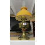 A brass 'Aladdin' oil lamp with shade.