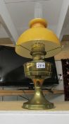 A brass 'Aladdin' oil lamp with shade.