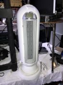 A Blyss PFH2000E ceramic tower heater with remote & instructions