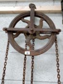 A 5 cwt cast iron sack hoist.