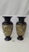 A good pair of Royal Doulton vases.