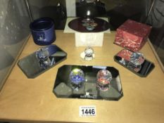 A collection of boxed & unboxed Swarovski prism paperweights & glass stands