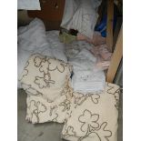 A quantity of white bed covers etc.