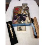 A mixed lot of costume jewellery & watches etc.