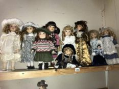 A box of collectors bisque headed dolls including Leonardo