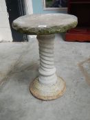 A garden pedestal.