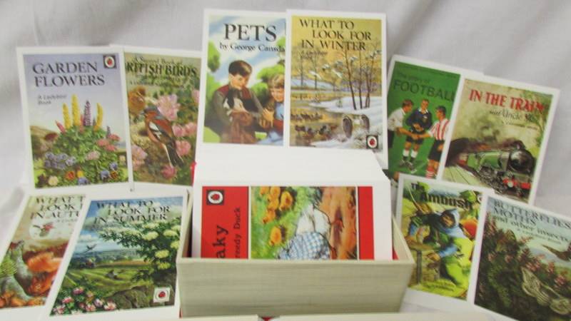 A small album of Royalty related postcards together with a box of advertising postcards. - Image 2 of 5