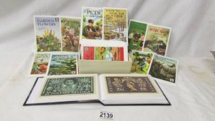 A small album of Royalty related postcards together with a box of advertising postcards.