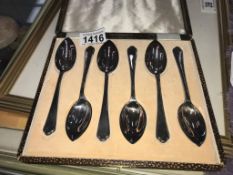 A cased set of teaspoons by Walker and Hall
