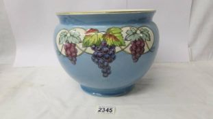 A Crownford pottery jardiniere.