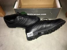 A new pair of Hi-Tec golf shoes size 8 in box