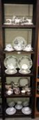 A large quantity of part tea sets including Wedgwood