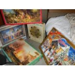A mixed lot of jigsaw puzzles and games.