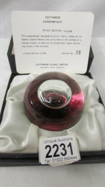 A Limited Edition Caithness glass paperweight "Space Beacon", damson, 89/500 (box a/f).