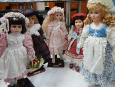 5 porcelain collector's dolls.