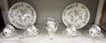 A Wedgwood cottage rose porcelain tea set ( 5 cups, 5 saucers, 6 plates,