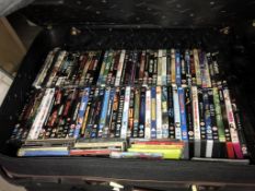A large suitcase containing DVD's & some CD's