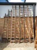 Ten wooden ladders.