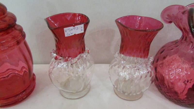 Six items of cranberry glass including pair of vases, single vase, lidded pot etc. - Image 3 of 6
