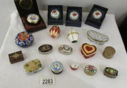 A collection of 18 enamel and other pill boxes.